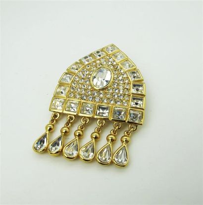 null YVES SAINT LAURENT Gilded metal mandorla-shaped
pendant brooch paved with rhinestones...
