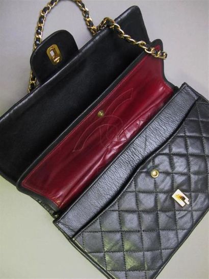 null CHANEL Paris
"Timeless" handbag in black quilted lamb leather with double flaps,...