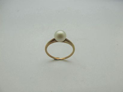 null Bague en or jaune sertie d'une perle. 
Poids brut : 1,8 g