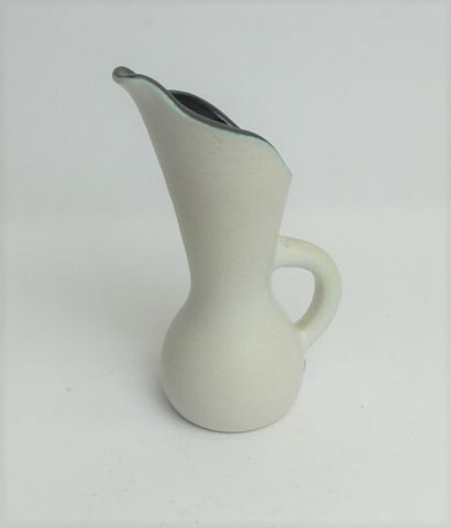 null CHAMBOST Pol (1906-1983) Ceramic 
pitcher with moving neck, glazed white on...