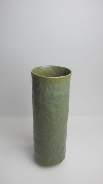 null UZAN Marc (b. 1955)
High cylinder vase in celadon enamelled shaped porcelain...