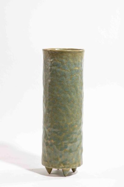 null UZAN Marc (b. 1955)
High cylinder vase in celadon enamelled shaped porcelain...