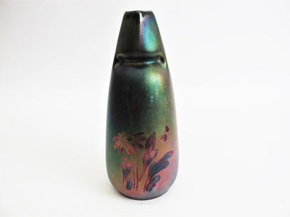 null WATCHES An ovoid ceramic pinch-neck 
vase with stylized floral decoration in...