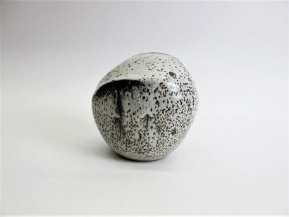 null HAIR Charles (born 1955) Faceted stoneware
ball with grey speckled enamel decoration....