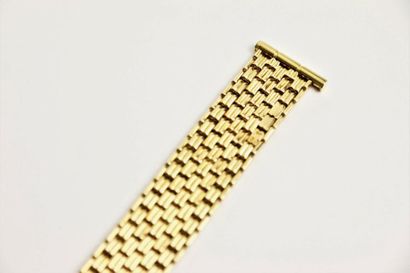 null BOUCHERON
Bracelet de montre modèle "reflet" en or jaune 750°/°°, les attaches...