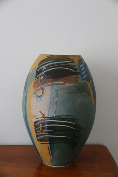 Oblong earthenware vase with polychrome painted...