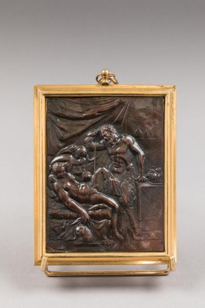 null Plaque en bronze à patine brune représentant un faune et une femme nue s'adonnant...