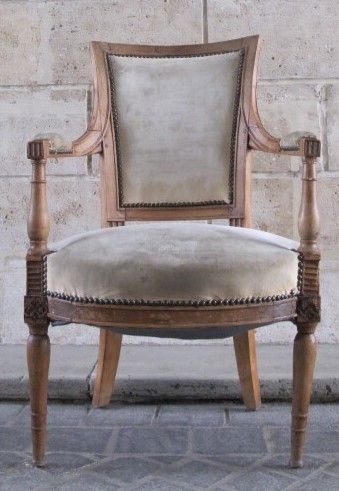 null Armchair in natural wood with armrests in fluted baluster column, sabre back...
