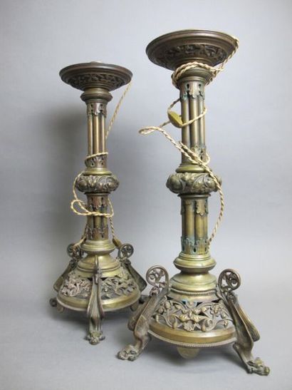 null Pair of torches in the neo-gothic style, mounted in lamp, bronze, tripod base...