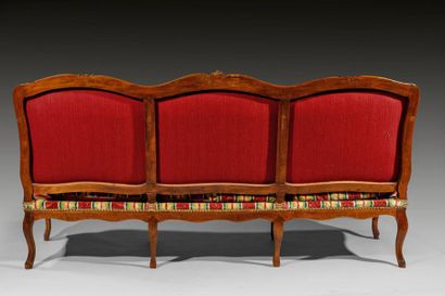 null Moulded and sculpted stained beechwood sofa with straight backrest with triple...