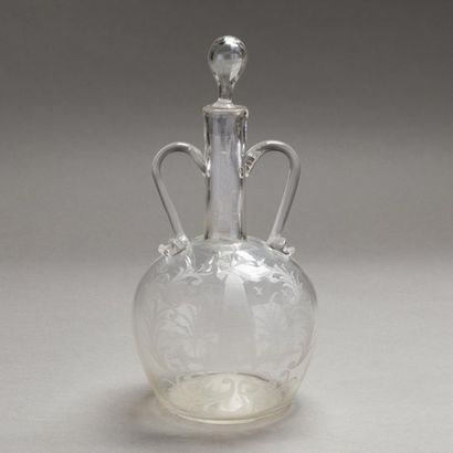 null Glass flask with two handles with engraved mill decoration in a landscape with...