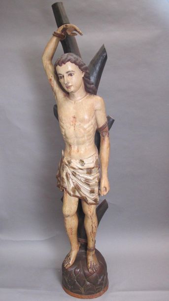 null San Sebastian in carved and polychromed wood. Standing with his right hand and...