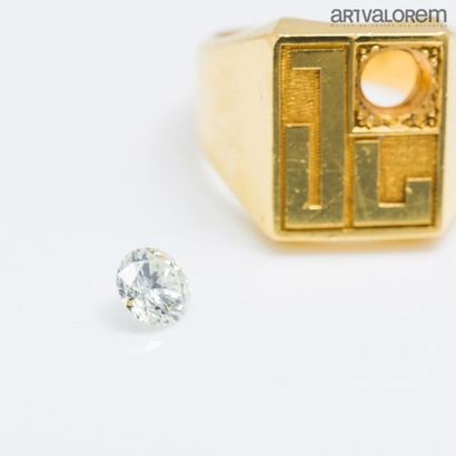 null Chevalière en or jaune 750°/°° monogrammée JL
Poids: 22 g

Diamant taille brillant...