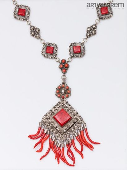 null Link set decorated with coral cabochons and sections of coral and resin forming...
