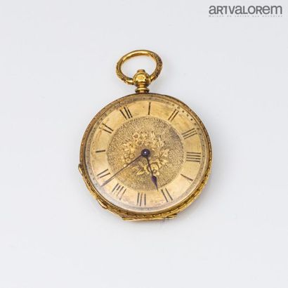 null Pocket watch in 750°/°° yellow gold, richly engraved with foliage and flowers....