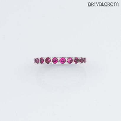 null American" wedding band in 925°/°° silver with pink tourmalines.
TDD: 52
Gross...