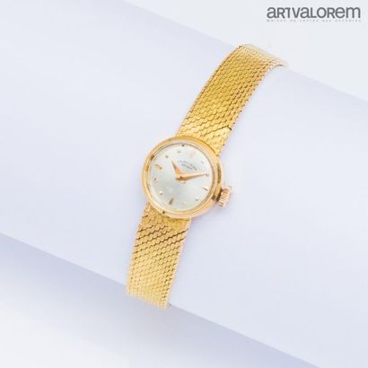 null FAVRE-LEUBA Geneva
Ladies' wristwatch in yellow gold, round silver dial with...