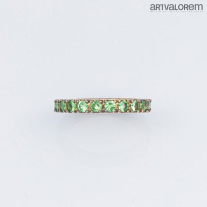 null American" wedding band in 925°/°° silver with green tourmalines.
TDD: 52
Gross...