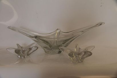 null DAUM, France. A cup with stretched edges and a pair of glass candleholders with...