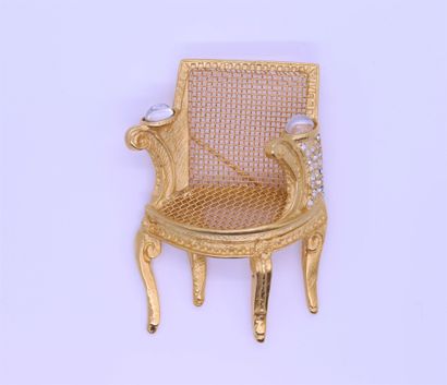 null Karl LAGERFELD édition limitée 

Broche fauteuil canné en métal doré, un accotoir...