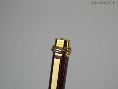 null CARTIER

Fountain pen model "Must" in burgundy lacquer with gold plated appointments.

With...