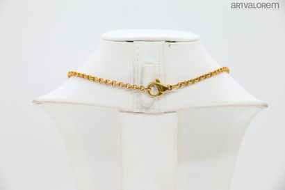 null CELINE

chaton link chain and lobster clasp holding a circular gold-plated metal...