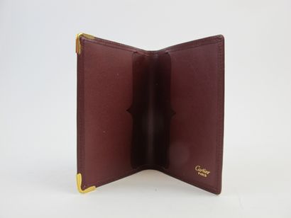 null CARTIER Must de Cartier

Card holder in burgundy calf leather, embossed double...