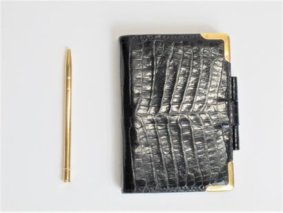 null HERMÈS Paris

Rare pocket diary in black porosus crocodile decorated with two...