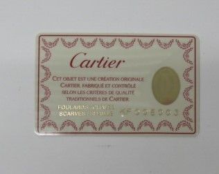 null CARTIER 

Silk square printed with a leopard and the emblematic panther motif,...