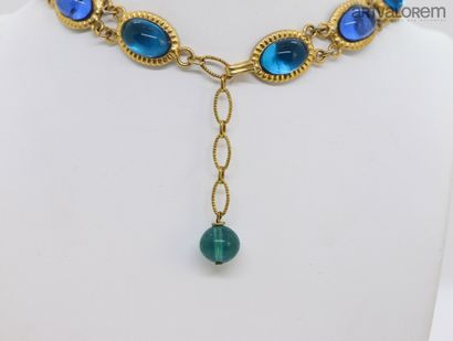 null GRIPOIX

Half-Ornament in gold-plated metal and blue and turquoise cast glass...