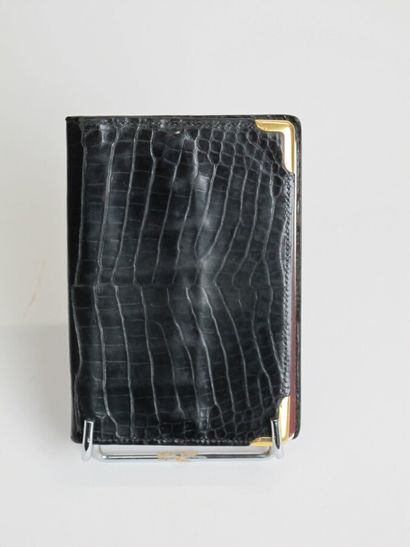 null HERMÈS Paris

Pocket diary in black porosus crocodile with two corners in 750°/°°...