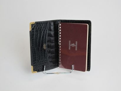 null HERMÈS Paris

Pocket diary in black porosus crocodile with two corners in 750°/°°...