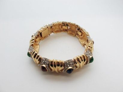null CINER
Bracelet articulé en métal doré orné de cabochons de verre rouge, vert...