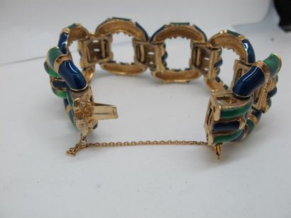 null CINER
Half-Ornament in green and blue enamelled gold metal with bamboo motifs...