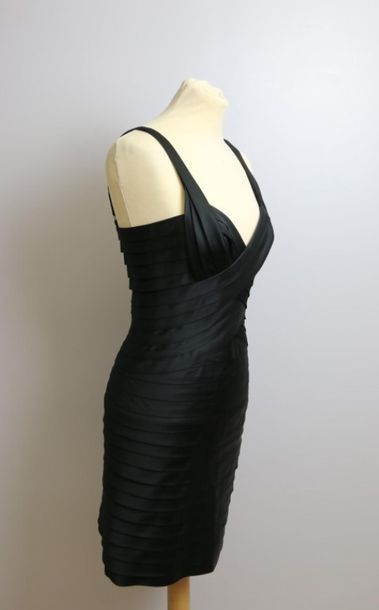 null BCBGMAXAZRIA,
Black satin cocktail dress with thin straps, fully pleated. 
Size...