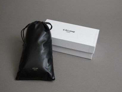 null CELINE 
Pair of sunglasses, blue outline. 
In its cover and in its box. 