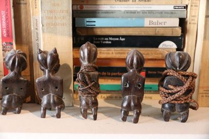 null AFRICA 
Nine wooden statuettes of women with a magical ventral charge. Link...