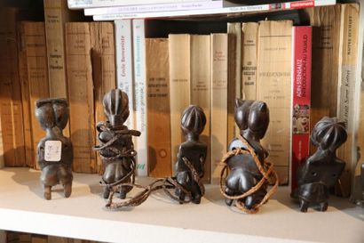 null AFRICA 
Nine wooden statuettes of women with a magical ventral charge. Link...