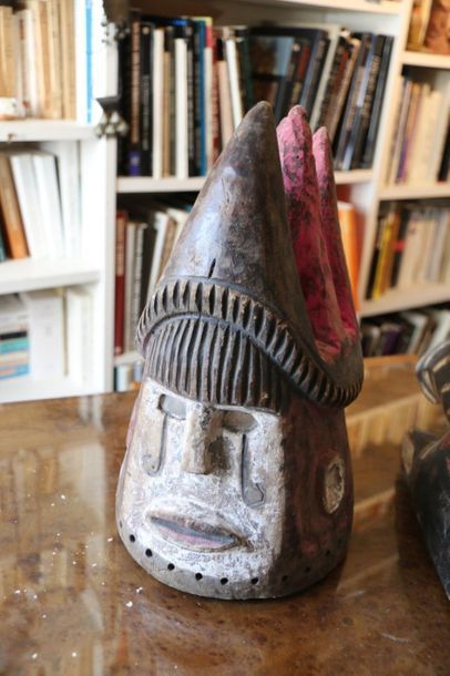 AFRICA
Wooden animal mask painted black and...
