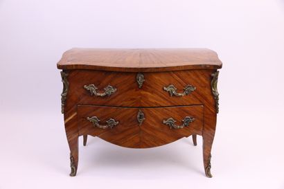 null Veneer master chest of drawers with a flap and a drawer. Gilded bronze ornamentation...