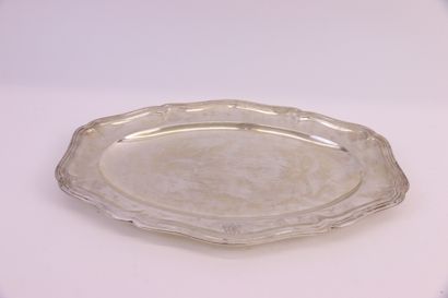 null Oval dish in 950°/°° silver with contoured threads, wing engraved with a monogram.

Minerva...