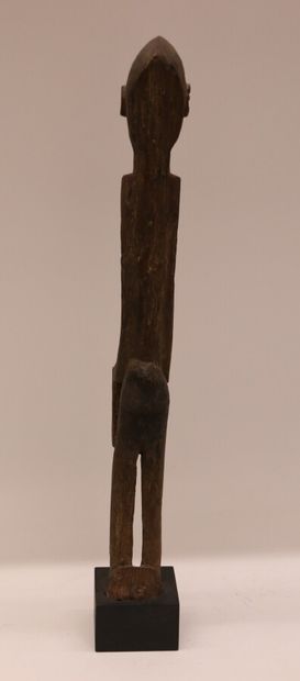 null MALI - DOGON période coloniale vers 1950-1960. 

Statue d'homme debout

H. 63...