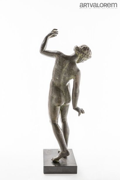 null According to the antique, bronze with a brown-green patina depicting a male...