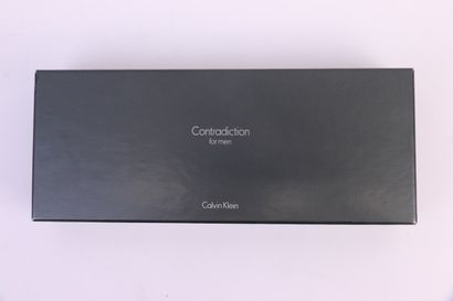 null Calvin Klein - "Contradiction" - (1990)

Coffret contenant un flacon contenant...