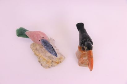 null 
Two toucans, one in pink quartz with sodalite beak and the other in black marble...