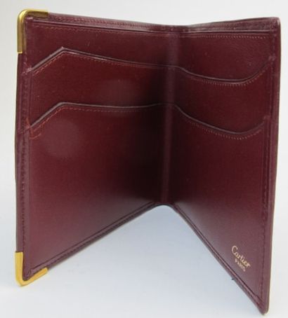 null CARTIER Must de Cartier

Wallet in burgundy calf leather, embossed double C...