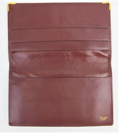 null CARTIER Must de Cartier

Burgundy calf leather checkbook holder, monogrammed...