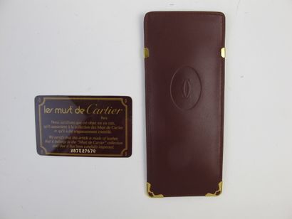 null CARTIER Must de Cartier

Key case in burgundy calf leather, monogrammed embossed...