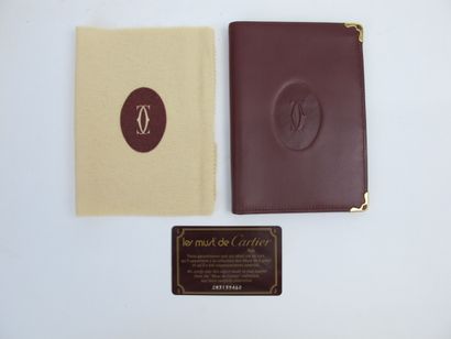 null CARTIER Must de Cartier

Passport holder in burgundy calf leather, monogrammed...