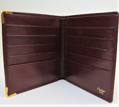 null CARTIER Must de Cartier

Wallet in burgundy calf leather, embossed double C...
